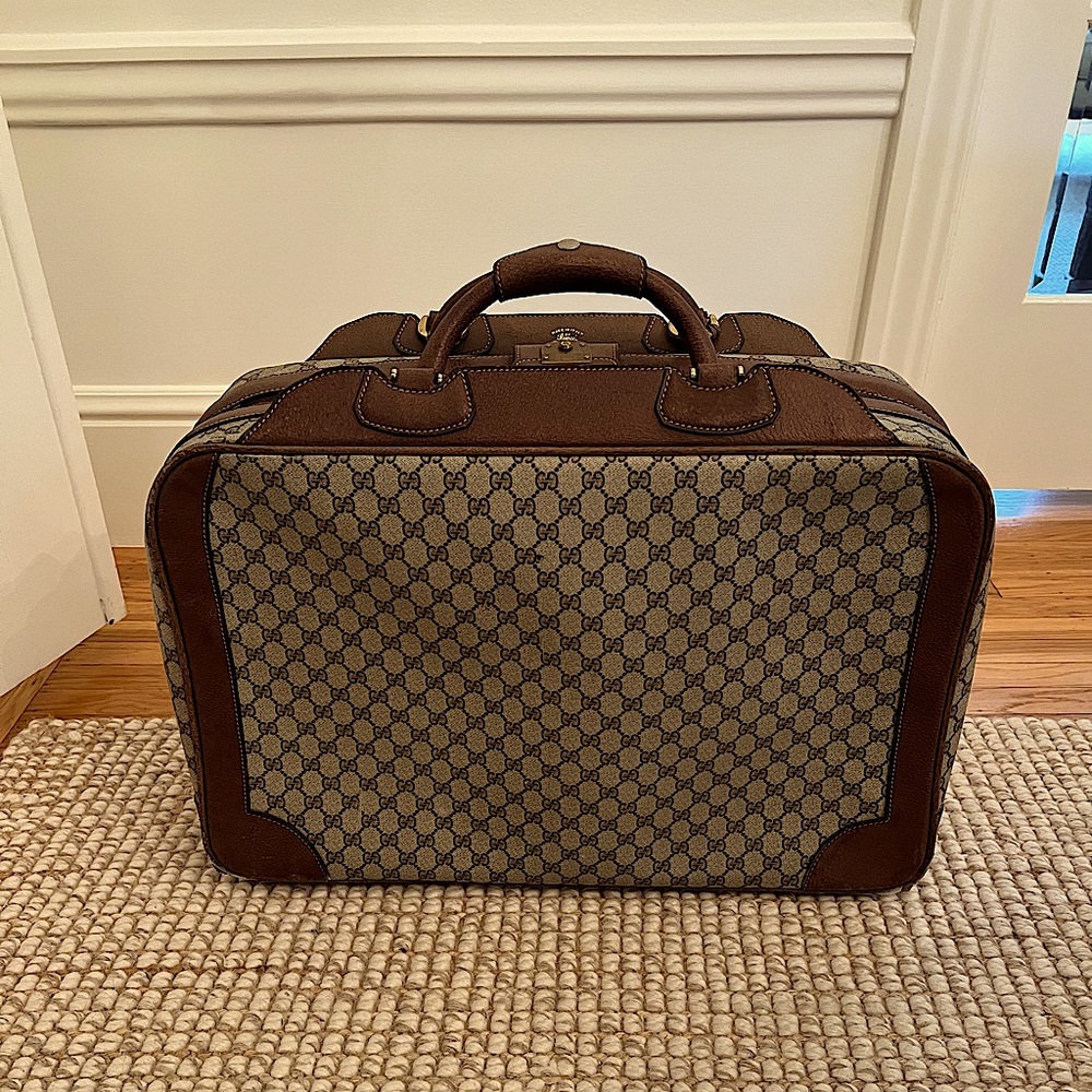 Gucci vintage suitcase, one owner. Some outside blemishes, one stain inside.